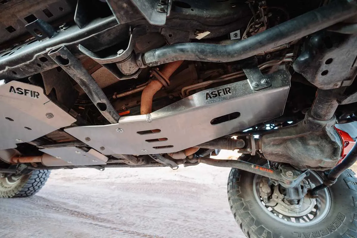 ASFIR aluminum skid plates under a Jeep on the trail