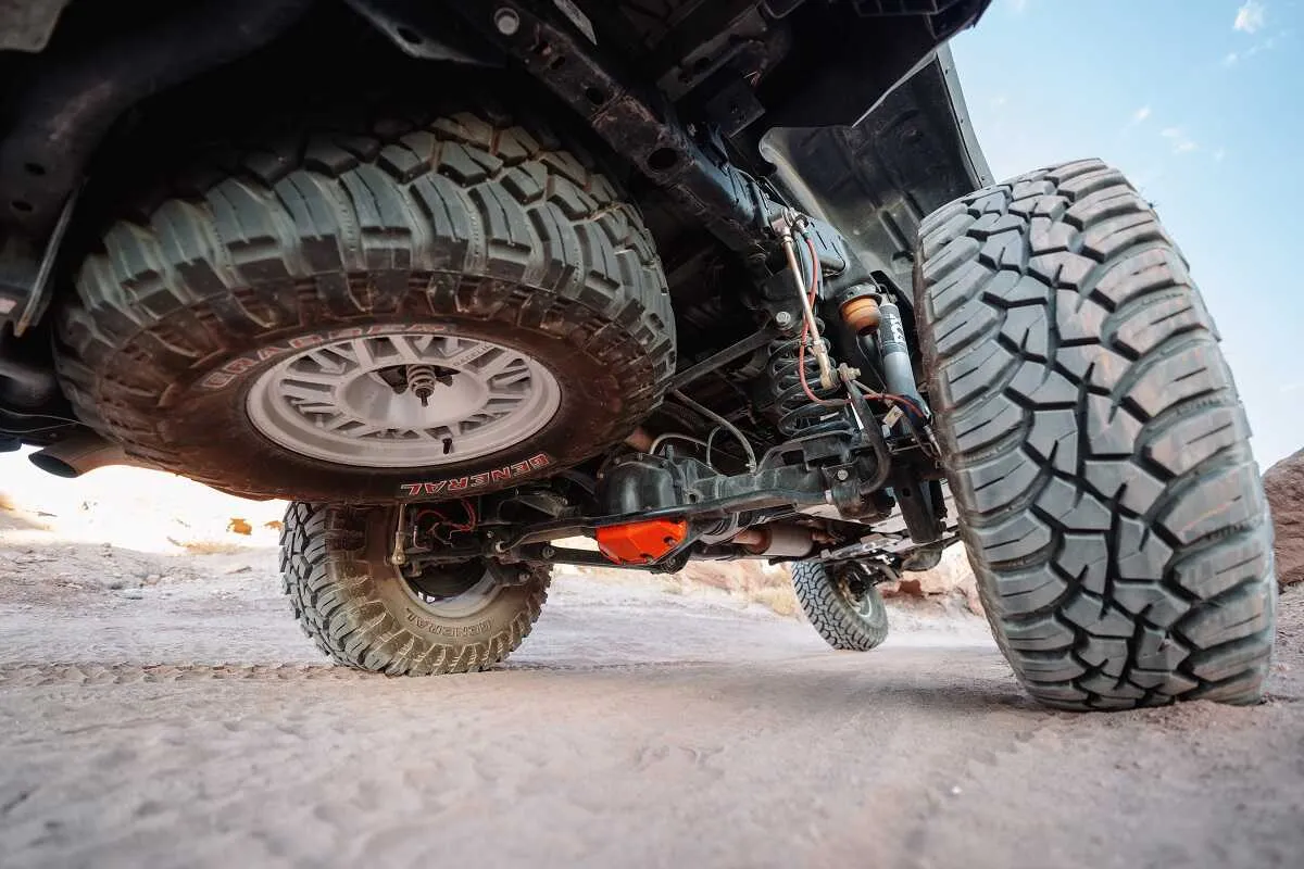 Jeep Gladiator flexing with ASFIR skid plates and red diff guard